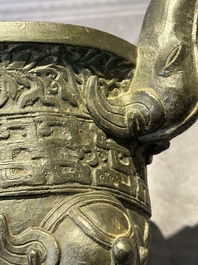 A Chinese bronze 'elephant' tripod censer and cover, Ming