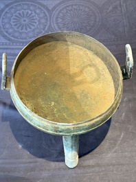 A Chinese archaic bronze tripod food vessel, 'ding 鼎', Eastern Han