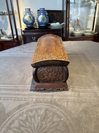 A Chinese Huanghuali wood coffin-shaped offering box and cover with mountainous landscape design, 17/18th C.