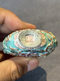 Five Chinese moulded famille rose snuff bottles, Qianlong mark, 19th C.