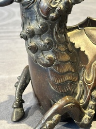 A fine Chinese bronze 'qilin' censer and cover, Ming