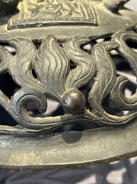 A Chinese bronze 'elephant' tripod censer and cover, Ming