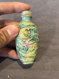 Five Chinese moulded famille rose snuff bottles, Qianlong mark, 19th C.