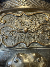 A large Chinese bronze censer and cover with a Buddhist lion, Ming