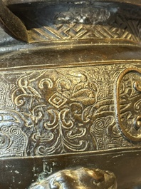 A large Chinese bronze censer and cover with a Buddhist lion, Ming