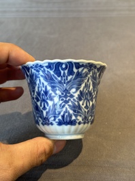 Five fine Chinese blue and white cups and saucers, 19th C.