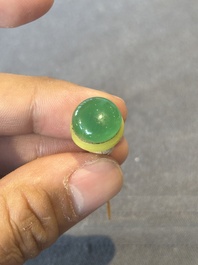 Five Chinese moulded famille rose snuff bottles, Qianlong mark, 19th C.