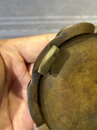 A Chinese bronze censer and stand, Xuande mark, 17th C.
