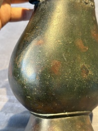 A Chinese silver-inlaid bronze arrow vase with Taotie design, 'touhu 投壺', Ming