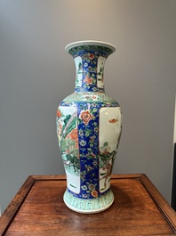A Chinese famille verte vase with warriors on horseback, 19th C.