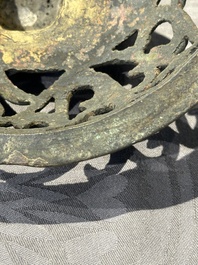 A Chinese bronze 'elephant' tripod censer and cover, Ming