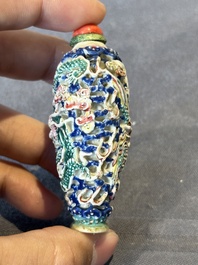 Five Chinese moulded famille rose snuff bottles, Qianlong mark, 19th C.