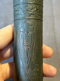 A Chinese bronze cylindrical 'cicada' flower arranging vase, Xuande mark, Ming