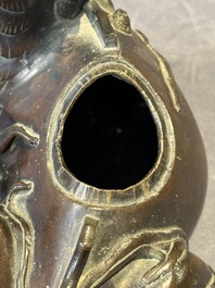 A fine Chinese bronze 'qilin' censer and cover, Ming