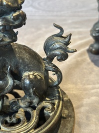 A large Chinese bronze censer and cover with a Buddhist lion, Ming