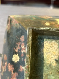 A Chinese archaic bronze vase with 'Taotie' handles, 'fang hu 方壺', Han