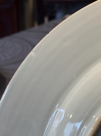 A Chinese bianco sopra bianco Belgian market armorial dish and a famille rose Dutch market armorial plate, Qianlong