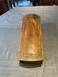 A Chinese Huanghuali wood coffin-shaped offering box and cover with mountainous landscape design, 17/18th C.