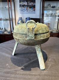 A Chinese archaic bronze tripod food vessel, 'ding 鼎', Eastern Han