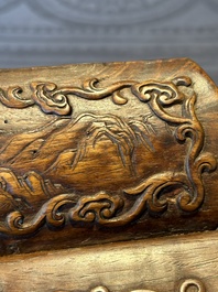 A Chinese Huanghuali wood coffin-shaped offering box and cover with mountainous landscape design, 17/18th C.