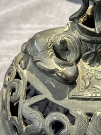 A Chinese bronze 'elephant' tripod censer and cover, Ming