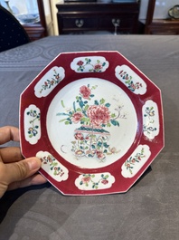 A Chinese octagonal famille rose ruby border plate with a flower basket, Yongzheng