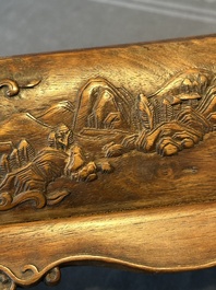 A Chinese Huanghuali wood coffin-shaped offering box and cover with mountainous landscape design, 17/18th C.