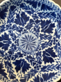 Five fine Chinese blue and white cups and saucers, 19th C.