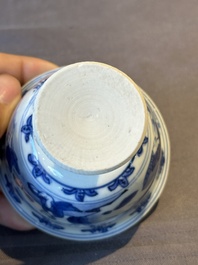 A Chinese blue and white stem cup with scholars in a landscape, Transitional period
