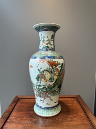 A Chinese famille verte vase with warriors on horseback, 19th C.