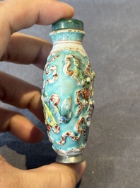 Five Chinese moulded famille rose snuff bottles, Qianlong mark, 19th C.