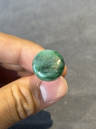 Five Chinese moulded famille rose snuff bottles, Qianlong mark, 19th C.