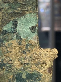 A group of four Chinese archaic bronze wares, late Shang, Warring States and Han