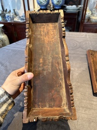 A Chinese Huanghuali wood coffin-shaped offering box and cover with mountainous landscape design, 17/18th C.