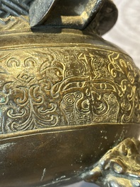 A large Chinese bronze censer and cover with a Buddhist lion, Ming