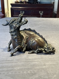 A fine Chinese bronze 'qilin' censer and cover, Ming
