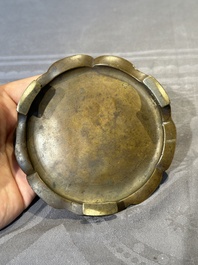 A Chinese bronze censer and stand, Xuande mark, 17th C.