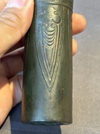 A Chinese bronze cylindrical 'cicada' flower arranging vase, Xuande mark, Ming