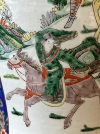 A Chinese famille verte vase with warriors on horseback, 19th C.