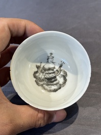 Four Chinese grisaille cups and saucers and a plate with blue-enamelled border, Qianlong