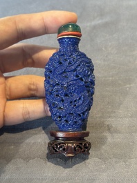 Five Chinese moulded famille rose snuff bottles, Qianlong mark, 19th C.