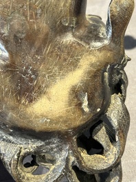 A fine Chinese bronze 'qilin' censer and cover, Ming