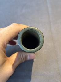 A Chinese bronze cylindrical 'cicada' flower arranging vase, Xuande mark, Ming