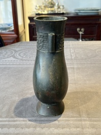 A Chinese silver-inlaid bronze arrow vase with Taotie design, 'touhu 投壺', Ming
