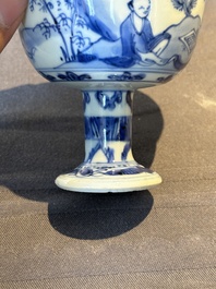 A Chinese blue and white stem cup with scholars in a landscape, Transitional period