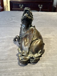 A fine Chinese bronze 'qilin' censer and cover, Ming