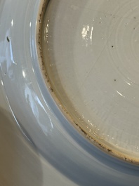 A Chinese bianco sopra bianco Belgian market armorial dish and a famille rose Dutch market armorial plate, Qianlong