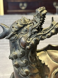 A fine Chinese bronze 'qilin' censer and cover, Ming