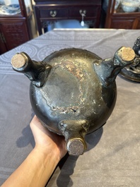 A large Chinese bronze censer and cover with a Buddhist lion, Ming