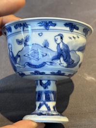 A Chinese blue and white stem cup with scholars in a landscape, Transitional period
